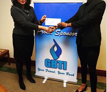 GBTI Public Relations and Marketing Manager Pamela Binda (left) presenting the sponsorship cheque to GLTA Vice-President Cristy Campbell.
