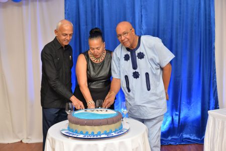 As the Guyana Water Incorporated (GWI) celebrated its 16th anniversary on Wednesday evening,  Managing Director Dr. Richard Van West-Charles dubbed it a successful year for the company. He noted however that this was not achieved without its challenges, a release from GWI said.
He was at the time addressing a gathering at the Company’s 16th Anniversary Prize Giving and Awards Ceremony, held at the Ramada Princess Hotel.  From left at the event are Minister of Communities, Ronald Bulkan; Chairman of the board, Patricia Chase-Green and Managing Director of GWI, Richard Van West-Charles. (GWI photo)