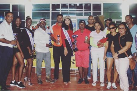 Nazeem ‘Papo’ Haniff (center in red) and Miss World Guyana 2018 Ambika Ramraj as well as other winners and sponsors following the completion of yesterday’s tournament.
