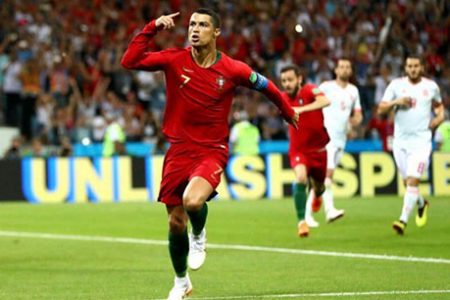 Portugal’s Cristiano Ronaldo scored a hat trick to help his team secure a 3-3 draw with Spain yesterday. (Reuters photo)