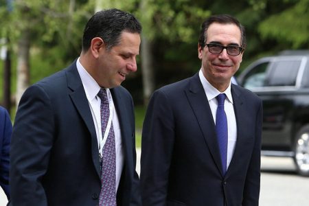 United States Secretary of the Treasury Steven Mnuchin (right) walks back to his hotel after the G7 Finance Ministers Summit in Whistler, British Columbia, Canada. (Reuters photo)