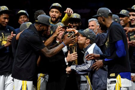 Golden State Warriors owner Peter Guber kisses the Larry O’Brien Championship Trophy after beating the Cleveland Cavaliers in game four of the 2018 NBA Finals at Quicken Loans Arena Friday night. Mandatory Credit: Kyle Terada-USA TODAY Sports
