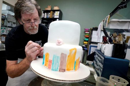 Baker, Jack Phillips, decorates a cake in his Masterpiece Cakeshop in Lakewood, Colorado U.S., on September 21, 2017. REUTERS/Rick Wilking/File Photo