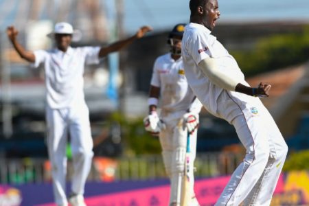 West Indies captain Jason Holder celebrates after capturing the wicket of Angelo Mathews on the fourth day of the opening Test. (Photo courtesy CWI Media)
