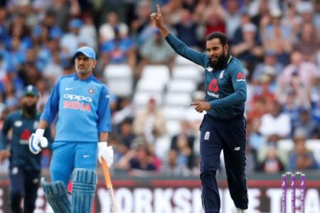 England v India, Third ODI, Headingley, Britain - July 17, 2018 England’s Adil Rashid celebrates taking the wicket of India’s Suresh Raina (Action Images via Reuters/Ed Sykes)