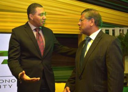 Prime Minister Andrew Holness (left), converses with British High Commissioner to Jamaica, Asif Ahmad, during Wednesday’s official opening of the Jamaica Special Economic Zone Authority at Waterloo Road, St. Andrew.
