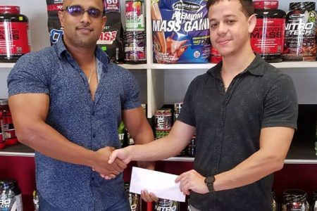  Fitness Express’ Darren McDonald (right) recently presented a cheque for a substantial sum to GBBFFI’s Vice President, Seeon Satrohan.