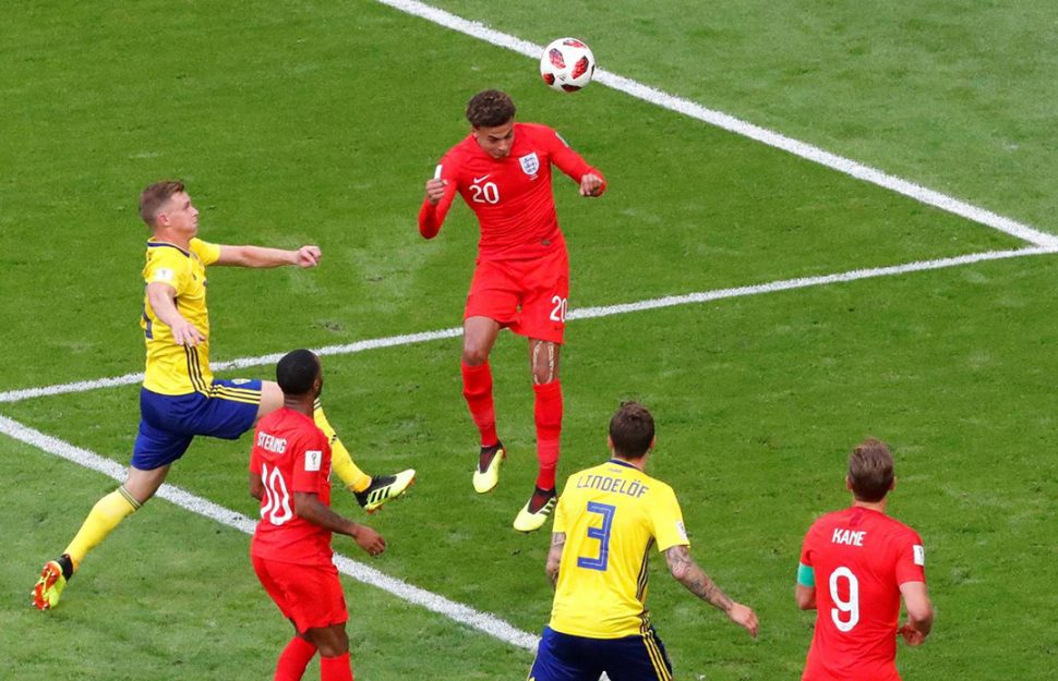 England’s Dele Alli rises up to head home their second goal. (Reuters)