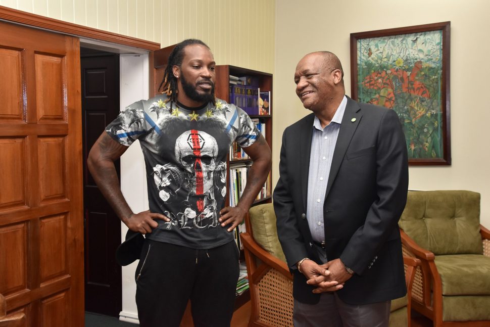 Minister of State, Joseph Harmon (right), today, received a courtesy call from West Indies cricketer Christopher Gayle at his office at the Ministry of the Presidency.

During the meeting, a release from the Ministry of the Presidency said that the two  discussed West Indies cricket, how the game can be improved and how it can influence the lives of both the young and the old.

“Cricket is not just a game, it is a part of our culture; it’s a lifestyle. This loved game of cricket is such a huge part of not just the Guyanese culture but it’s a part of our Caribbean culture, it is one of the sports that unify our people. The Government of Guyana fully supports the team and its players,” Harmon said.

The West Indies will face Bangladesh in a day/night match on Wednesday  starting at 2.30 pm at the Guyana National Stadium.
