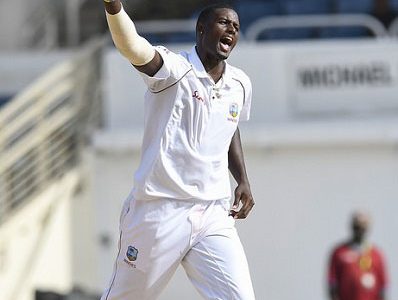 West Indies captain Jason Holder celebrates another wicket as West Indies demolish Bangladesh on the third day of the final Test yesterday.