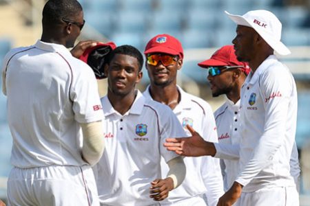 Guyana’s Keemo Paul celebrates his first test wicket. (Photo courtesy Cricket West Indies)