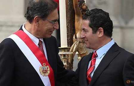 Peru’s President Martin Vizcarra (left) and Justice Minister Salvador Heresi attend a swearing-in ceremony at the government palace in Lima, Peru April 2, 2018. 