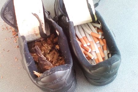 The cannabis and cigarettes discovered in the pair of boots that was on its way to a prisoner. 