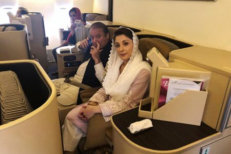 Ousted Pakistani Prime Minister Nawaz Sharif and his daughter Maryam sit on a Lahore-bound flight due for departure, at Abu Dhabi International Airport, UAE July 13, 2018. REUTERS/ Drazen Jorgic

