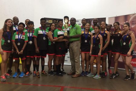 Team Guyana receiving their second prize trophy.