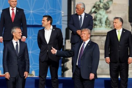 NATO Secretary General Jens Stoltenberg, Poland’s President Andrzej Duda, Greek Prime Minister Alexis Tsipras, U.S. President Donald Trump, Portugal’s Prime Minister Antonio Costa, Hungarian Prime Minister Viktor Orban pose for a group photo in the park of the Cinquantenaire, during a NATO Summit, in central Brussels, Belgium July 11, 2018. REUTERS/Yves Herman