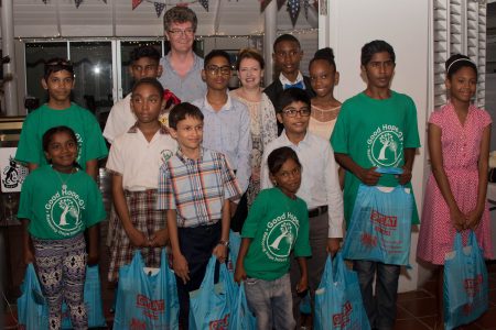 British High Commissioner to Guyana Gregory Quinn and his wife Wendy Quinn with the winners of the art competition. (DPI photo)
