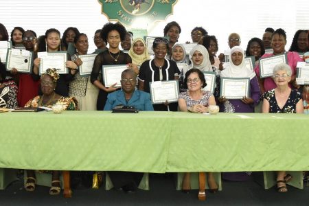 The women trained along with First Lady Sandra Granger (seated second from right) and the trainers. (Ministry of the Presidency photo)
