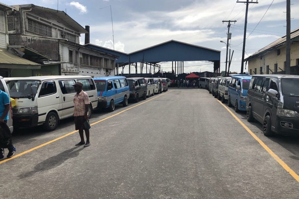 Buses lined off yesterday, on the southern and northern sides of Bugle Street, the temporary location for the Route 42 Bus Park