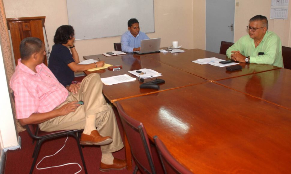 GMSA top officials Shyam Nokta (centre), Ramsay Ali and Ramesh Dookhoo at a briefing session with the Stabroek Business earlier this week