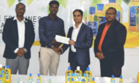Mark Alleyne (second from left) is seen receiving the sponsorship from Zulfikar Ali of the New GPC’s. GFF President Wayne Forde is at left and Petra Director Troy Mendonca, right.