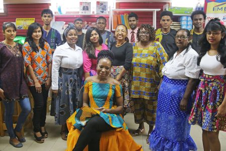Staff of the Metro stationery store all decked out in their Emancipation Day garb yesterday. (Terrence Thompson photo)