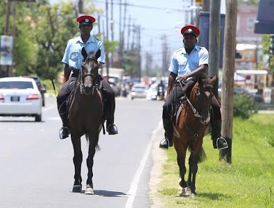 Mounted officers of the Guyana Police Force cantering along Thomas Lands yesterday morning. (Terrence Thompson photo) 