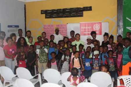 Children from in and around the Sophia area who received back-to-school hampers courtesy of the Rotaract Club of Georgetown. 