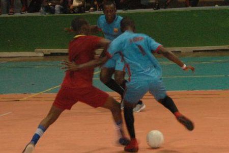 Scenes from the Back Circle and Albouystown clash in the Keep Ya Five Alive Futsal Championships at the National Gymnasium.
