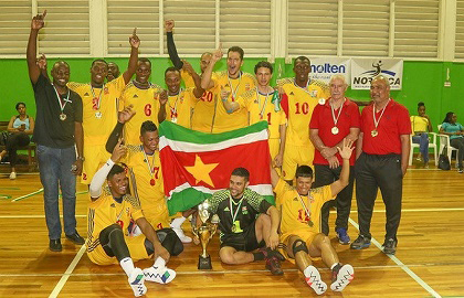 Suriname celebrate their capture of the men’s Caribbean Volleyball Championship. (Photo courtesy NORCECA)
