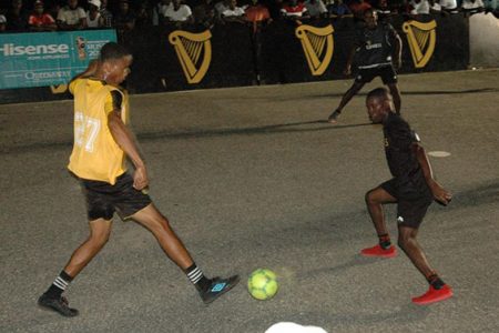 Scenes from the quarterfinal clash between Avocado Ballers (yellow) and Sparta Boss in the Guinness Cage Streetball Championship at the Haslington Market Tarmac.
