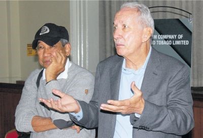 Petrotrin chairman Wilfred Espinet during a press conference following yesterday’s announcement of the termination of the company’s Refining and Marketing operations. At left is board member Anthony Chan Tack.