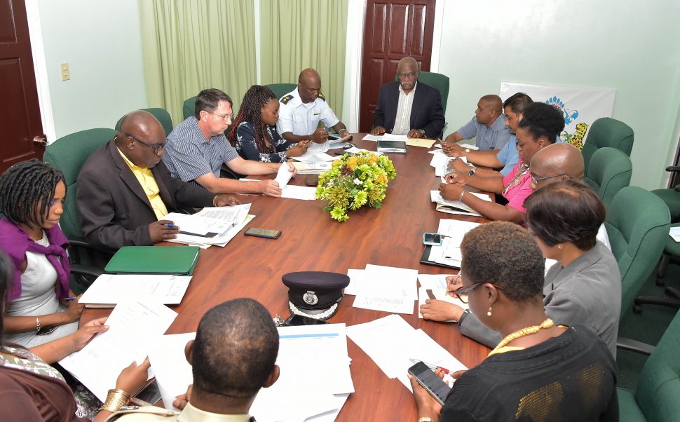 Minister of Citizenship Winston Felix (at head of table) at the meeting with other stakeholders.  (Ministry of the Presidency photo)