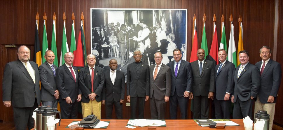 President David Granger (seventh from right) with the delegation and other officials (Ministry of the Presidency photo)