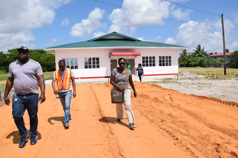 Minister of Education Nicolette Henry (right) visiting one of the schools on Saturday (DPI photo)