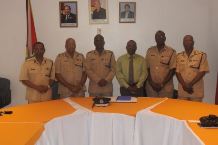 Leslie James (third from left) at the meeting. (Police photo)