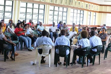 Members of the GTU negotiating team reporting to members following a three-hour meeting with government officials. 