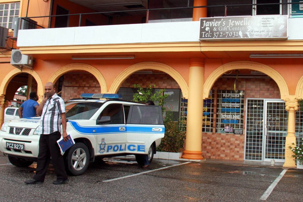 A police vehicle parked in front of Javier’s Jewellery.