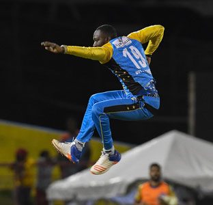 Kesrick Williams of St Lucia Stars celebrates the dismissal of Kennar Lewis of Jamaica Tallawahs during match 17 of the Hero Caribbean Premier League between St Lucia Stars and Jamaica Tallawahs at the Darren Sammy Cricket Ground on Saturday in Gros Islet, Saint Lucia. (Photo by Randy Brooks - CPL T20/Getty Images)
