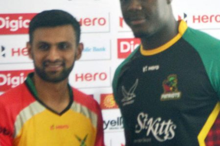 Let the party begin! Shoaib Malik (left) and Carlos Brathwaite shake hands before they showdown at Providence tonight