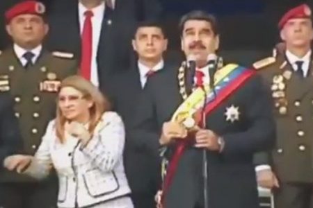 Venezuelan President Nicholas Maduro looks to the sky as an explosion is heard during a live address to the military in Caracas on Aug. 4, 2018. (Venezuelan State TV)