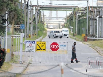 The entrance to the Petrotrin Refinery in Pointe-a-Pierre yesterday. Petrotrin’s management is expected to meet with OWTU officials to discuss the future of the company today. 
