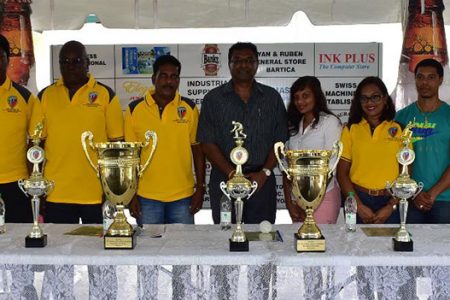 Minister of Public Security Khemraj Ramjattan (centre) with Georgetown Softball Cricket League executives and sponsors at the launch of Prime Minister Softball Cup 2 on Sunday at Everest Cricket Club. 