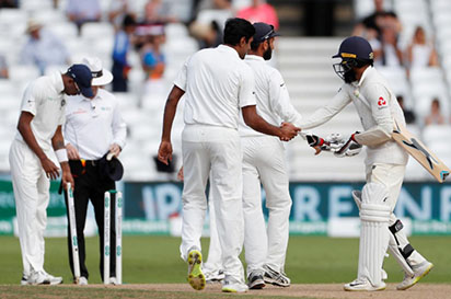 England’s Adil Rashid shakes hands with India players after India win the third test Action Images via Reuters/Paul Childs