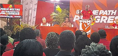 PM Dr Keith Rowley addresses supporters during a public meeting at the Malabar Community Centre in Arima last night.