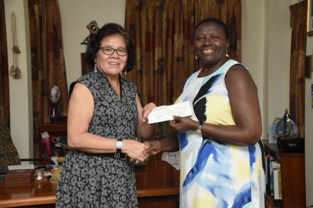First Lady,  Sandra Granger, yesterday, on behalf of Science, Technology, Engineering, and Mathematics (STEM) Guyana, received a US$2,300 cheque from Beryl James, Secretary of the Guyana United Youth Development Association (GUYDA), according to a release from the Ministry of the Presidency.  
GUYDA is a New York-based Organisation, which raises funds for youth development in Guyana and throughout the Caribbean. The meeting was held at the Office of the First Lady, State House.     In this Ministry of the Presidency photo, First Lady Sandra Granger (left) receives the donation.