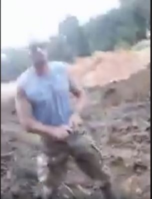 One of the Ukrainians  allegedly about to take a weapon from his waist during one of the incidents.