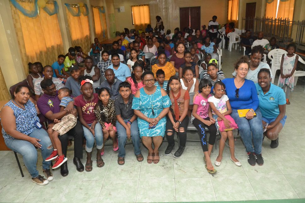 Minister of Public Health, Volda Lawrence (seated at centre)  with the campers and others (DPI photo).