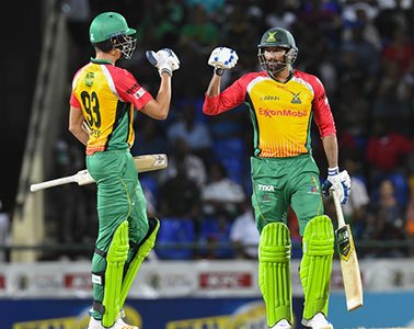 Chris Green (L) Sohail Tanvir (R ) of Guyana Amazon Warriors during match 19 of the Hero Caribbean Premier League between St Kitts & Nevis Patriots and Guyana Amazon Warriors at the Warner Park Sporting Complex. (Photo by Randy Brooks - CPL T20/Getty Images)
