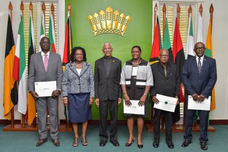 President David Granger (fourth from right) with, from left, Paul Slowe, Vesta Adams, Claire Jarvis, Clinton Conway and Michael Somersall. (Ministry of the Presidency photo)